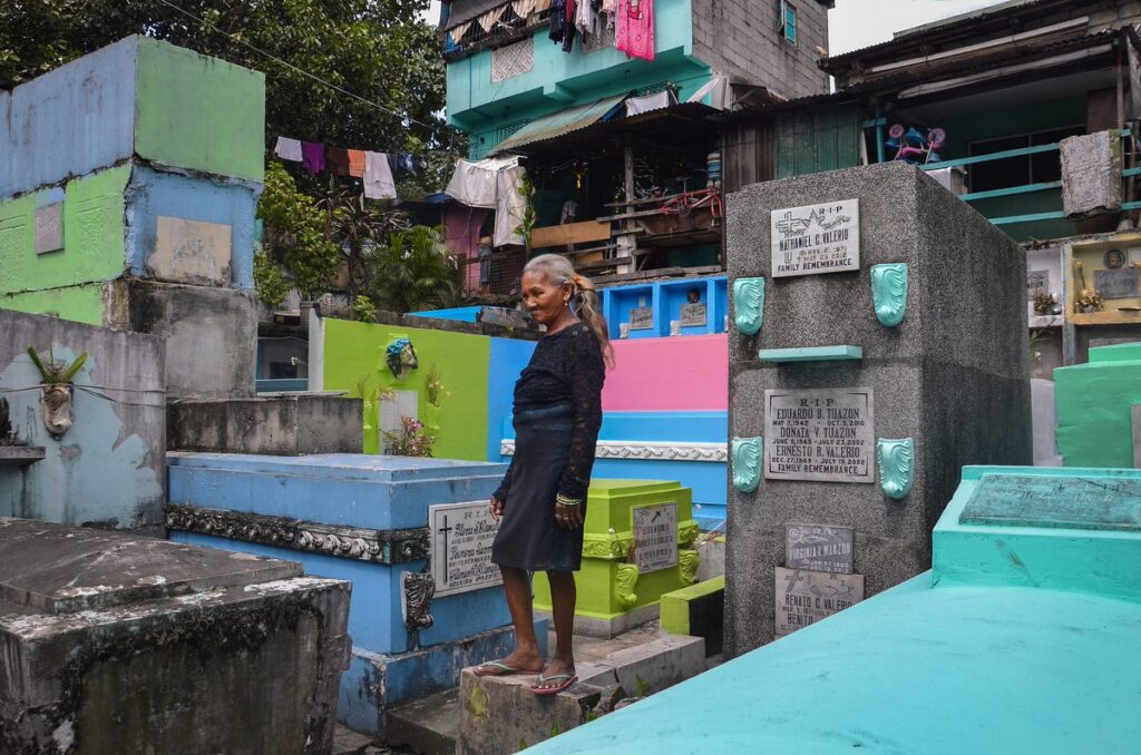 Residents of a cemetery in Manila, Philippines